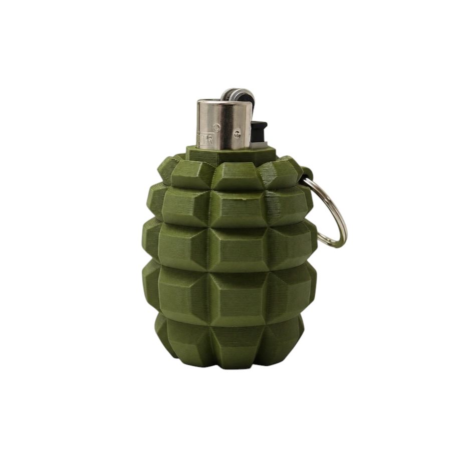 Briquet Granata Superstuff vert kaki en forme de grenade avec reliefs géométriques et anneau métallique